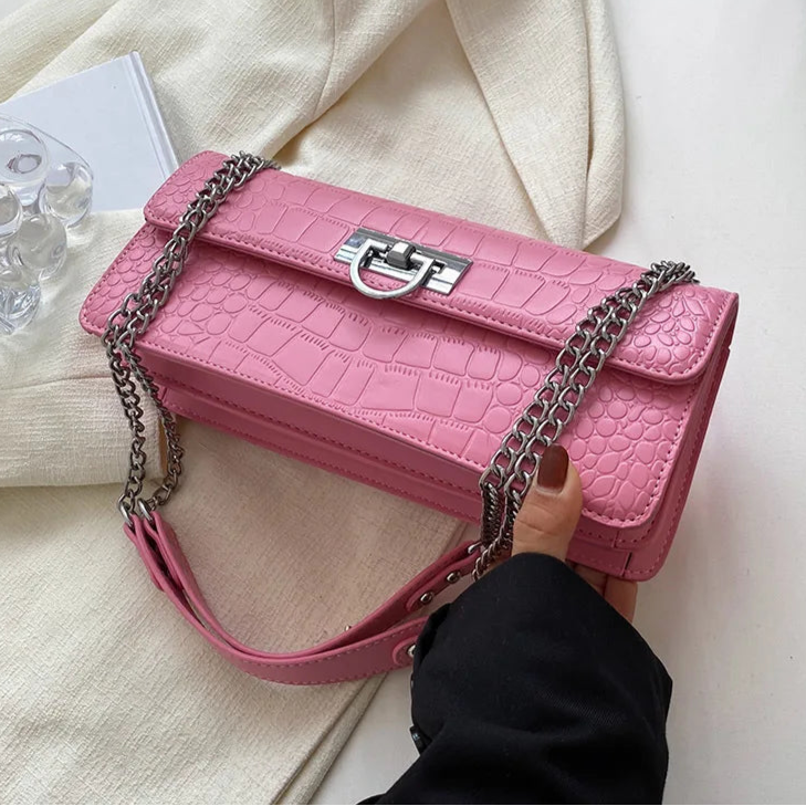 LunaStone mini shoulder bag with stone pattern and chain accents