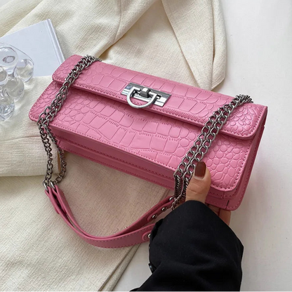 LunaStone mini shoulder bag with stone pattern and chain accents