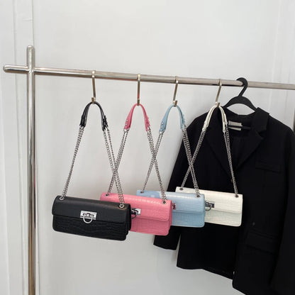 LunaStone mini shoulder bag with stone pattern and chain accents